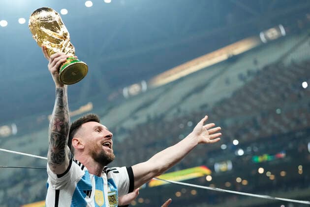 Argentina v France: Final - FIFA World Cup, WM, Weltmeisterschaft, Fussball Qatar 2022 Lionel Messi right winger of Argentina and Paris Saint-Germain with the the World Cup Winners Cup trophy after the FIFA World Cup Qatar 2022 Final match between Argentina and France at Lusail Stadium on December 18, 2022 in Lusail City, Qatar. Lusail City Qatar  Copyright: xJosexBretonx originalFilename:breton-argentin221218_np7pB.jpg
