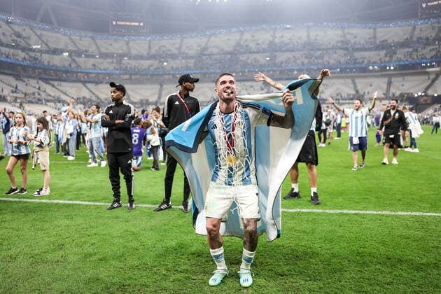 QATAR, LUSAIL - DECEMBER 18, 2022: Argentina s player Rodrigo de Paul (C) celebrates after the trophy ceremony for the 2022 FIFA World Cup, WM, Weltmeisterschaft, Fussball final football match between Argentina and France at Lusail Iconic Stadium. Argentina won 3-3 (4-2) in a penalty shootout. Sergei Bobylev TASS  56489077