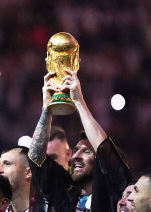 Football , FIFA World Cup 2022, Football World Cup Qatar 2022, Final, Final, Argentina France, Argentina France 18 12 2022, Lusail Stadium Doha Qatar, Lionel Messi Argentina with trophy award ceremony photo Chai von der Laage FIFA regulations prohibit any use of photographs as image sequences and or quasi video EDITORIAL USE ONLY,