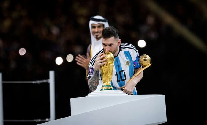 Doha, Qatar 18th Dec, 2022 Lionel Messi Arg with his best player trophy kisses World Cup 2022 trophy Argentina France Final Match Argentina France World Cup 2022 in Qatar 18 12 2022