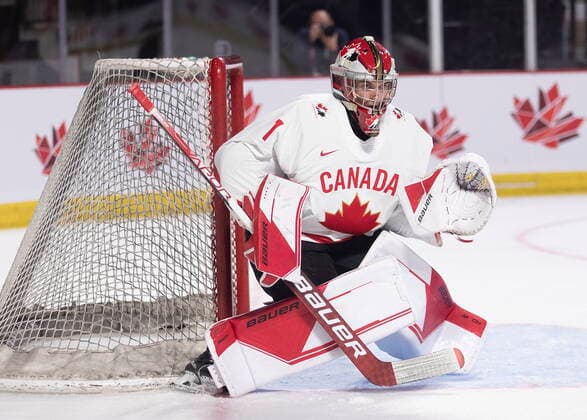 December 19, 2022, Moncton, NB, Canada: Canadaös Thomas Milic watches the play against Switzerland during third period IIHF World Junior Hockey Championship pre-tournament hockey action in Moncton, N.B., on Monday, Dec. 19, 2022. Canada News - December 19, 2022  - ZUMAc35_ 20221219_zaf_c35_074 Copyright: xRonxWardx