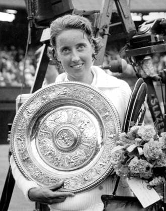 Angela Mortimer Angela Mortimer hold the ladies singles championship trophy after her victory at Wimbledon against Christine Truman. 8th July 1961. Great Britain  Copyright: xTopFotox 0047872
