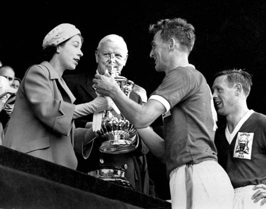 1959 FA Cup Final H.M.The Queen presents the FA Cup to Jack Burkitt, the captain of Nottingham Forest after his team had defeated Luton Town 2-1 in the FA Cup final at Wembley. 2nd May 1959. Great Britain  Copyright: xTopFotox 0145887