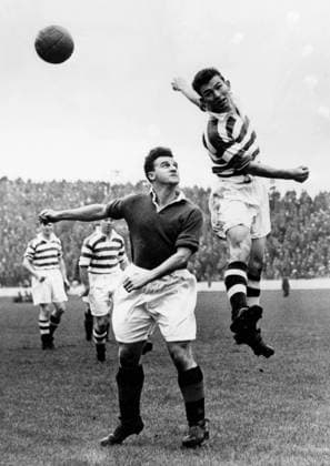 Rangers v Celtic Glasgow Rangers v Celtic. Grierson of Rangers (eft) and Peacock of Celtic, jump to head the ball during the match at Ibrox Park, which ended in a 1-1 draw. A riot broke out at half-time and thousands of spectators invaded the pitch. Ambulance men treated casualties and the police made nine arrests. 21st September 1953 Great Britain  Copyright: xTopFotox 0559299