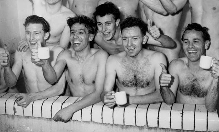 Bournemouth Members of the Bournemouth team toast themselves in the bath at the end of the match after defeating Tottenham Hotspur in the FA Cup Fifth Round at Dean Court. 16th February 1957 Great Britain  Copyright: xTopFotox 0580872
