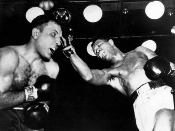 PALUPI Sugar Ray Robinson cuts loose in the thirteenth round of his fight with Jake La Motta in Chicago. Robinson won on this round on a TKO United States  Copyright: xTopFotox 0582735