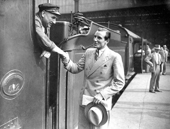 F J Perry F J Perry - the world s No 1 tennis player - left Waterloo on the Berengaria boat train for America Photo shows Fred Perry shaking hands with the engine driver at Waterloo. 7th August 1935 Great Britain  Copyright: xTopFotox 0637025