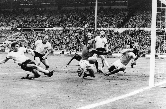 1966 World Cup Final Just a few seconds to go in the World Cup Final and West Gemany s Wolfgang Weber side-foots the ball past England s Gordon Banks, Goalkeeper, to snatch the eualiserat Wembley Stadium July 30th 1966. In the extra time that followed, England scored twice to end up 4-2 winners. Also in this picture are West German captain Uwe Seeler (second left) England s Ramon Wilson (dark shirt); behind Wilson is Moore, the England captain; Schnellinger (white shirt) and in the background extreme right, Jackie Charlton. Just seen in hte background centre, is George Cohen, the other England pull back. 30 July 1966  Copyright: xTopFotox 0973514
