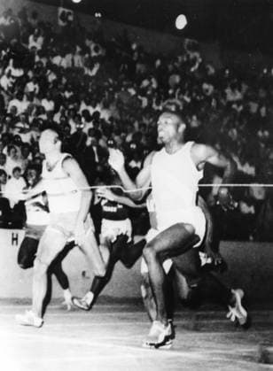 PALUPI Jim Hines of Houston (right) crosses the finish line in a 100 metres semi-final in world record time of 9.9 seconds. Second is Ronnie Ray Smith. AZU Track and Field Championships , Sacramento , California 21st June 1968 United States  Copyright: xTopFotox 1121706