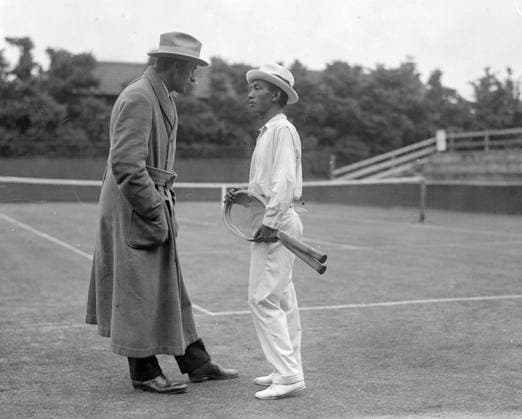 Tilden and Shimidzu Wimbledon Tennis Championships , 1921. US player , Bill Tilden talks to Japanese player , Zenzo Shimidzu. United Kingdom England  Copyright: xTopFotox 1129198