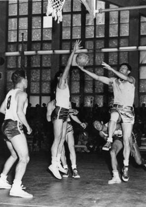 Argentina V Philippines Bball OLYMPIC BASKETBALL - ARGENTINA V PHILIPINNES Incident during the basketball match between Argentina and the Philippines at the Tennis Palace , Helsinki ( Left to Right ) ; A L Martinez ( 8 ) and R Hechanova of the Philippines team , reaching for the ball ; Argentina s H O De Vecchio ( foot in the air ) and M Toelentino of the Philippines ( crouching ) Argentina won . 26th July 1952 Finland  Copyright: xTopFotox UPI235780