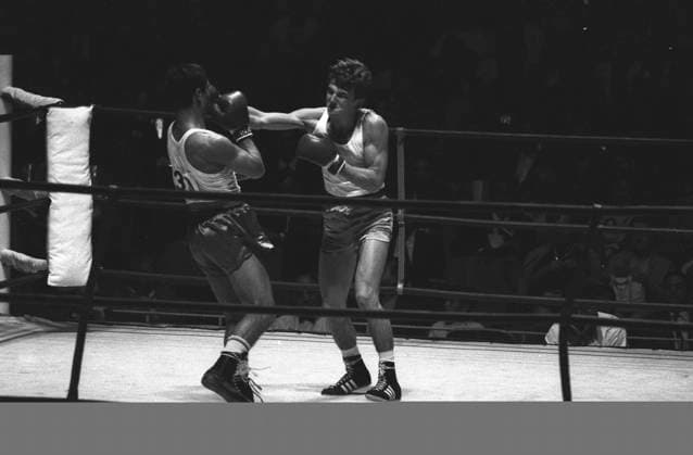 Boxing Olympic Games, Olympische Spiele, Olympia, OS Ivan Mihailov ( left ) of Bulgaria and Jan Wadas of Poland , trade blows in the third round of their Olympic featherweight elimination bout in Mexico City . 18th October 1968 Mexico  Copyright: xTopFotox UPI563063