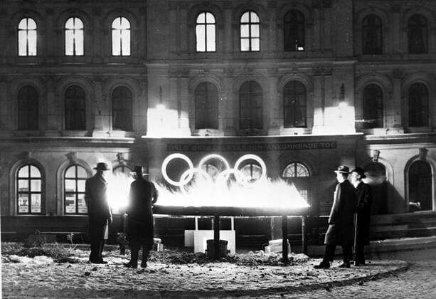 Olympic Illuminations Olympic Illuminations This way to the Olympics . Illuminated sign at Jernbanetorget , Oslo , It is the Olympic emblem surmounting the entracne to the railway station on the route to Holmenkollen , venue of the Winter Olympics Skiing contest 2nd February 1952 Norway  Copyright: xTopFotox UPI59321