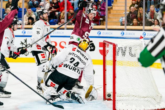 DAVOS, SWITZERLAND DECEMBER 26 Daniel Pribyl of Sparta Prague celebrates his goal in front of goalkeeper Michael Hutchinson of Team Canada during the match between HC Sparta Praha and Team Canada at Hockey Club Davos on December 26, 2022 in Davos, Switzerland Davos Graubunden Switzerland  Copyright: xJustPictures.ch JarixPestelaccix
