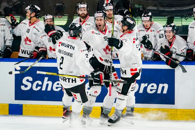 DAVOS, SWITZERLAND DECEMBER 26 Brett Connolly of Team Canada C celebrates his goal with Thomas Gregoire of Team Canada L and Daniel Carr of Team Canada R during the match between HC Sparta Praha and Team Canada at Hockey Club Davos on December 26, 2022 in Davos, Switzerland Davos Graubunden Switzerland  Copyright: xJustPictures.ch JarixPestelaccix