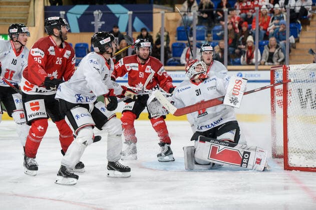 29 12 2022, Davos, Eisstadion Davos, Spengler Cup Orebro HK Team Canada, goalkeeper Jonas Arntzen of Örebro HK against David Desharnais of Team Canada and Daniel Winnik of Team Canada Davos Eisstadion Davos Graubünden Switzerland  Copyright: xJustPictures.ch AndreaxBrancax