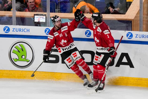 DAVOS, SWITZERLAND DECEMBER 29 Chris Didomenico of Team Canada L celebrates his goal with Josh Brook of Team Canada R during the match between Orebro HK and Team Canada at Eisstadion Davos on December 28, 2022 in Davos, Switzerland Davos Graubunden Switzerland  Copyright: xJustPictures.ch JarixPestelaccix