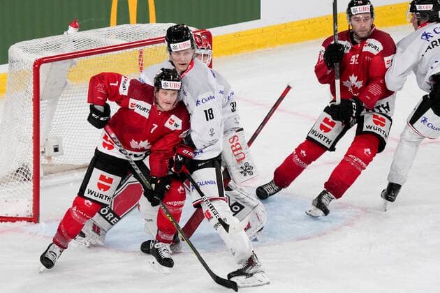DAVOS, SWITZERLAND DECEMBER 29 Daniel Carr of Team Canada L fight for a position into the slot against Rodrigo Abols of Örebro HK during the match between Orebro HK and Team Canada at Eisstadion Davos on December 28, 2022 in Davos, Switzerland Davos Graubunden Switzerland  Copyright: xJustPictures.ch JarixPestelaccix