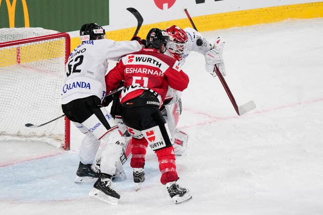 DAVOS, SWITZERLAND DECEMBER 29 goalkeeper Jonas Arntzen of Örebro HK saves during the match between Orebro HK and Team Canada at Eisstadion Davos on December 28, 2022 in Davos, Switzerland Davos Graubunden Switzerland  Copyright: xJustPictures.ch JarixPestelaccix