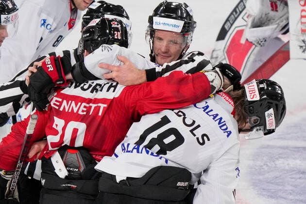DAVOS, SWITZERLAND DECEMBER 29 Kristopher Bennett of Team Canada L against Rodrigo Abols of Örebro HK R during the match between Orebro HK and Team Canada at Eisstadion Davos on December 28, 2022 in Davos, Switzerland Davos Graubunden Switzerland  Copyright: xJustPictures.ch JarixPestelaccix