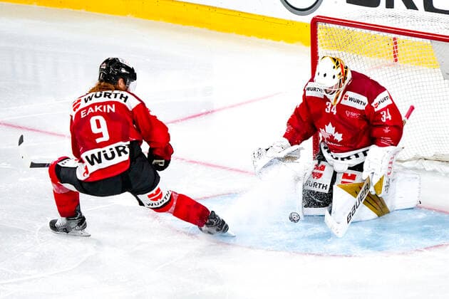 DAVOS, SWITZERLAND DECEMBER 29 goalkeeper Michael Hutchinson of Team Canada saves during the match between Orebro HK and Team Canada at Eisstadion Davos on December 28, 2022 in Davos, Switzerland Davos Graubunden Switzerland  Copyright: xJustPictures.ch JarixPestelaccix