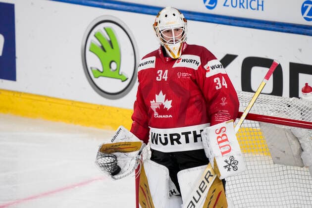 DAVOS, SWITZERLAND DECEMBER 29 goalkeeper Michael Hutchinson of Team Canada waiting the referee during the match between Orebro HK and Team Canada at Eisstadion Davos on December 28, 2022 in Davos, Switzerland Davos Graubunden Switzerland  Copyright: xJustPictures.ch JarixPestelaccix