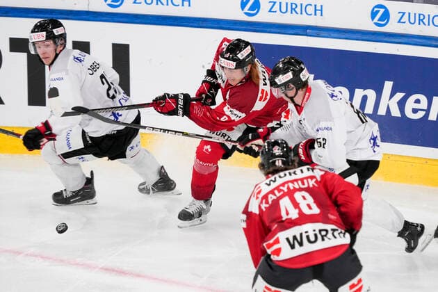 DAVOS, SWITZERLAND DECEMBER 29 Cody Eakin of Team Canada C against Robert Leino of Örebro HK behind Cody Eakin during the match between Orebro HK and Team Canada at Eisstadion Davos on December 28, 2022 in Davos, Switzerland Davos Graubunden Switzerland  Copyright: xJustPictures.ch JarixPestelaccix