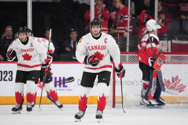 December 29, 2022, Halifax, NS, Canada: Canada™s Shane Wright, centre, and Dylan Guenther, left, skate back to the bench after a goal in front of Austria™s goaltender Benedikt Oschgan during first period IIHF World Junior Hockey Championship action in Halifax on Thursday, December 29, 2022. Shane Wright, Dylan Guenther, Benedikt Oschgan  - ZUMAc35_ 20221229_zaf_c35_054 Copyright: xDarrenxCalabresex