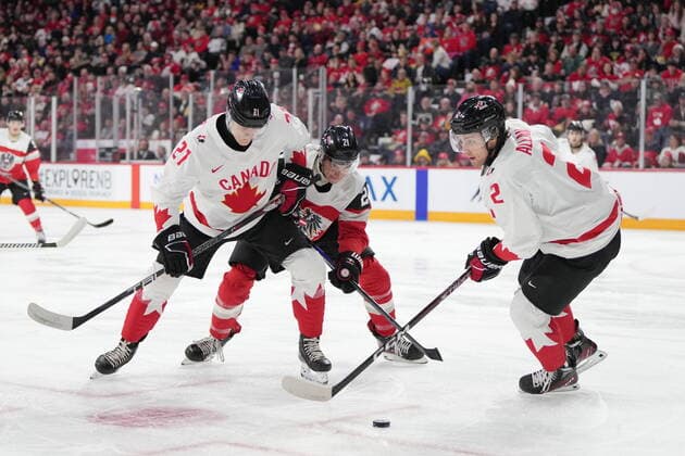 December 29, 2022, Halifax, NS, Canada: Canada™s Nathan Gaucher, left, and Nolan Allan, right, battle for the puck with Austria™s Tim Geifes during first period IIHF World Junior Hockey Championship action in Halifax on Thursday, December 29, 2022. Nathan Gaucher, Nolan Allan, Tim Geifes  - ZUMAc35_ 20221229_zaf_c35_055 Copyright: xDarrenxCalabresex