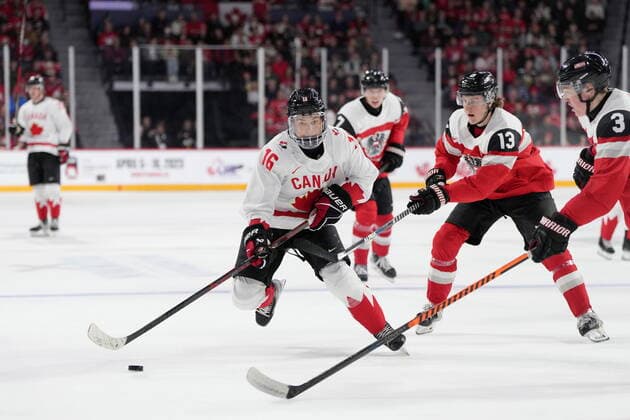 December 29, 2022, Halifax, NS, Canada: Canada™s Connor Bedard, left, skates past Austria™s Lukas Horl, right, and Luca Auer during second period IIHF World Junior Hockey Championship action in Halifax on Thursday, December 29, 2022. Connor Bedard, Lukas Horl, Luca Auer  - ZUMAc35_ 20221229_zaf_c35_063 Copyright: xDarrenxCalabresex