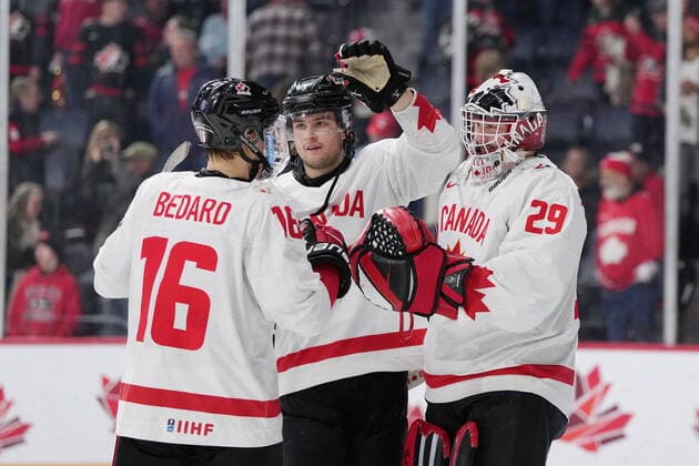 December 29, 2022, Halifax, NS, Canada: Canada™s Connor Bedard, left to right, Joshua Roy, and goaltender Benjamin Gaudreau celebrate Canada™s win over Austria during IIHF World Junior Hockey Championship action in Halifax on Thursday, December 29, 2022. Connor Bedard, Joshua Roy, Benjamin Gaudreau  - ZUMAc35_ 20221229_zaf_c35_076 Copyright: xDarrenxCalabresex
