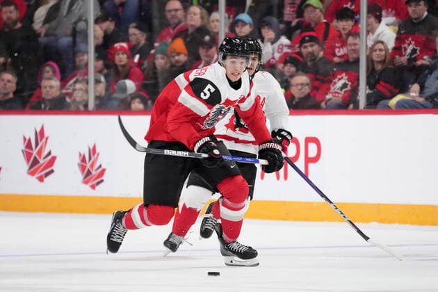 December 29, 2022, Halifax, NS, Canada: Austria™s David Reinbacher, left, skates with the puck during first period IIHF World Junior Hockey Championship action against Canada in Halifax on Thursday, December 29, 2022. David Reinbacher  - ZUMAc35_ 20221229_zaf_c35_082 Copyright: xDarrenxCalabresex