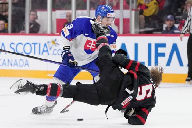 January 2, 2023, Halifax, NS, Canada: Canada s Brandt Clarke, right, is hit by Slovakia s Robert Baco during second period IIHF World Junior Hockey Championship quarterfinal action in Halifax, Monday, Jan. 2, 2023. Robert Baco, Brandt Clarke  - ZUMAc35_ 20230102_zaf_c35_112 Copyright: xDarrenxCalabresex