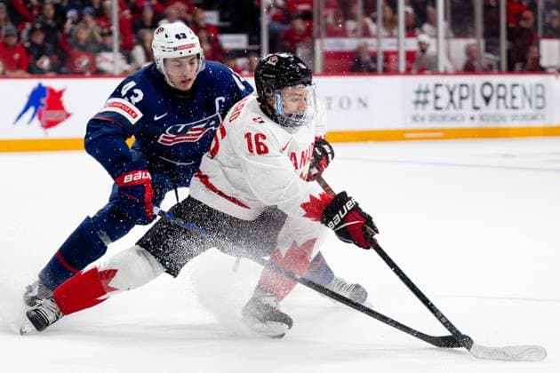 230105 Connor Bedard of Canada and Luke Hughes of USA during the 2023 IIHF World Junior Championship semifinal between USA and Canada on January 5, 2023 in Halifax Photo Simon Hastegard BILDBYRAN kod SH SH0402 ishockey ice hockey jvm junior vm u20 2023 iihf world junior championship world juniors semifinal semifinals usa canada kanada bbeng,  Copyright: SIMONxHASTEGARD BB230105SH024