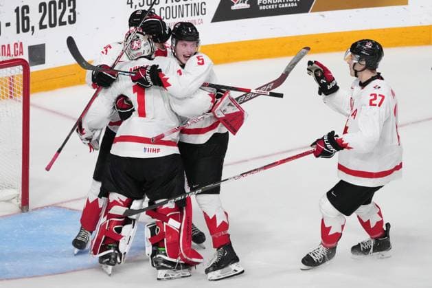 January 4, 2023, Halifax, NS, Canada: Canada s Thomas Milic, left to right, Brandt Clarke, Jack Matier and Jack Matier celebrate their win over USA during IIHF World Junior Hockey Championship semifinal action in Halifax on Wednesday, January 4, 2023. Thomas Milic, Brandt Clarke, Jack Matier  - ZUMAc35_ 20230104_zaf_c35_113 Copyright: xDarrenxCalabresex