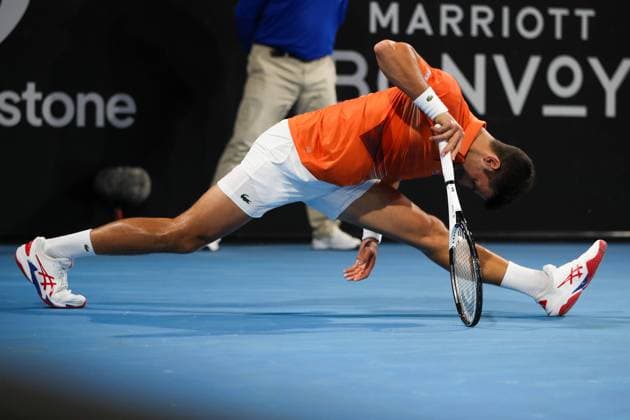 TENNIS ADELAIDE INTERNATIONAL, Novak Djokovic of Serbia injures his hamstring in his Semi Final match against Daniil Medvedev during the 2023 Adelaide International Tennis Tournament at the Memorial Drive Tennis Centre in Adelaide, Saturday, January 7, 2023. ( NO ARCHIVING, EDITORIAL USE ONLY, NO USE IN BOOKS WITHOUT CONSENT ADELAIDE SOUTH AUSTRALIA AUSTRALIA  Copyright: xMATTxTURNERx 20230107001749741036
