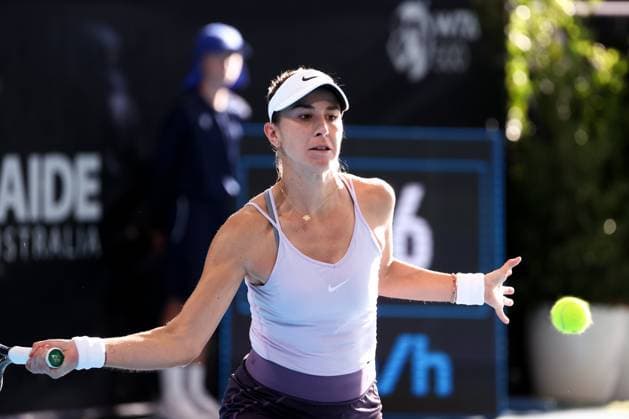 ADELAIDE, AUSTRALIA - JANUARY 09: Belinda Bencic of Switzerland plays a forehand during the Adelaide International tennis match between Garbine Muguruza of Spain and Belinda Bencic of Switzerland at Memorial Drive on January 09, 2023 in Adelaide, Australia. (Photo by Peter Mundy Speed Media Icon Sportswire) TENNIS: JAN 09 - Adelaide International Icon2301090007