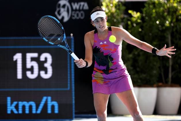 ADELAIDE, AUSTRALIA - JANUARY 09: Garbine Muguruza of Spain plays a forehand during the Adelaide International tennis match between Garbine Muguruza of Spain and Belinda Bencic of Switzerland at Memorial Drive on January 09, 2023 in Adelaide, Australia. (Photo by Peter Mundy Speed Media Icon Sportswire) TENNIS: JAN 09 - Adelaide International Icon2301090022