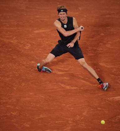 (230110) -- BEIJING, Jan. 10, 2023 -- Alexander Zverev falls injured on court during the men s singles semifinal match between Alexander Zverev of Germany and Rafael Nadal of Spain at the French Open tennis tournament at Roland Garros in Paris, France, June 3, 2022. ) (SP)XINHUA-PICTURES OF THE YEAR 2022 MengxDingbo 