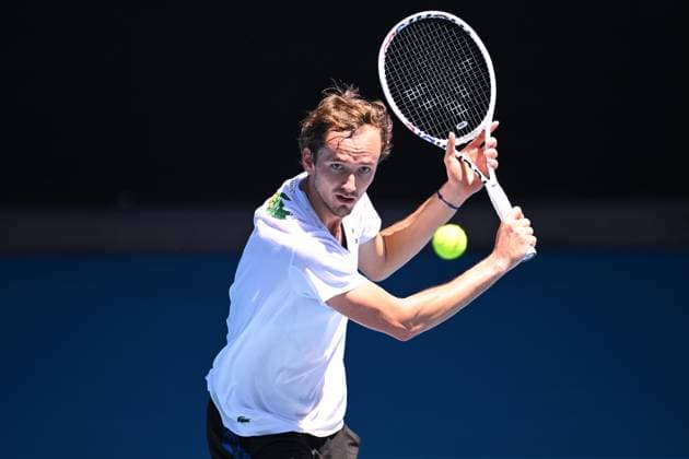 AUSTRALIAN OPEN PRACTICE, Daniil Medvedev of Russia in action against Novak Djokovic of Serbia during an Australian Open practice match at Melbourne Park in Melbourne, Wednesday, January 11, 2023. ( NO ARCHIVING, EDITORIAL USE ONLY, NO USE IN BOOKS WITHOUT CONSENT MELBOURNE VIC AUSTRALIA  Copyright: xJAMESxROSSx 20230111001751002982