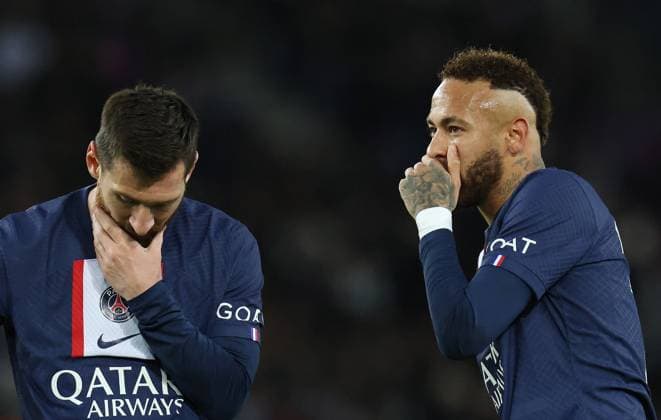 (230112) -- PARIS, Jan. 12, 2023 -- Paris Saint-Germain s Lionel Messi (L) and Neymar react during the French League 1 football match between Paris Saint-Germain FC and Angers at the Parc des Princes stadium in Paris, Jan. 11, 2023. ) (SP)FRANCE-PARIS-FOOTBALL-LIGUE 1-PSG VS ANGERS GaoxJing 