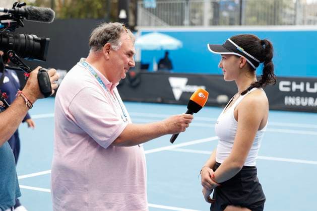 ZDF reporter Sven Goern does an on-court TV interview with Eva Lys,Australian Open qualifier, Melbourne Park Melbourne, Victoria Australia Copyright: xJuergenxHasenkopfx
