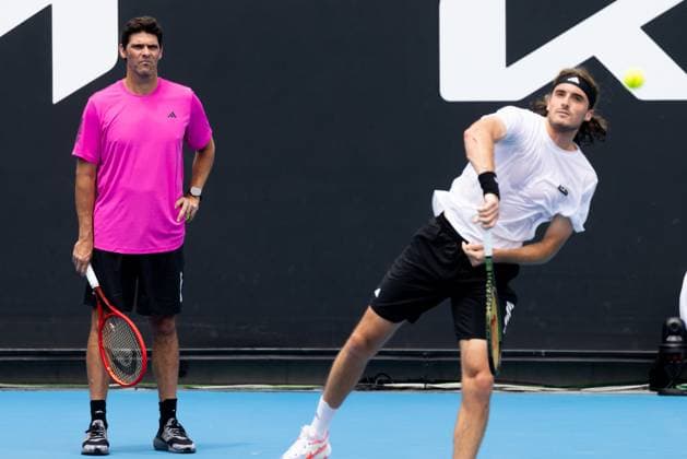January 13, 2023, Melbourne, Victoria, Australia: MELBOURNE, AUSTRALIA - JANUARY 13: Mark Philippoussis (AUS) coaches Stefanos Tsitsipas of Greece in practice ahead of the 2023 Australian Open at Melbourne Park on January 13, 2023 in Melbourne, Australia. Melbourne Australia - ZUMAp121 20230113_zsp_p121_057 Copyright: xChrisxPutnamx