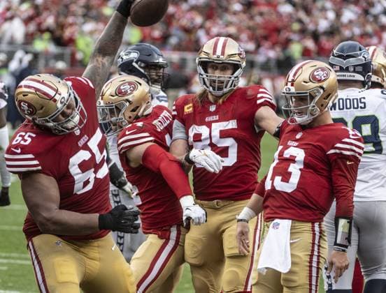 Sport Themen der Woche KW02 Sport Bilder des Tages San Francisco 49ers guard Aaron Banks (65) spikes the football after quarterback Brock Purdy (13) scored on a one yard keeper against the Seattle Seahawks in the third quarter of the NFC Wildcard game at Levi s Stadium in Santa Clara, California on Saturday, January 14, 2023. The 49ers defeated the Seahawks 41-23.  SXP2023011425 TERRYxSCHMITT