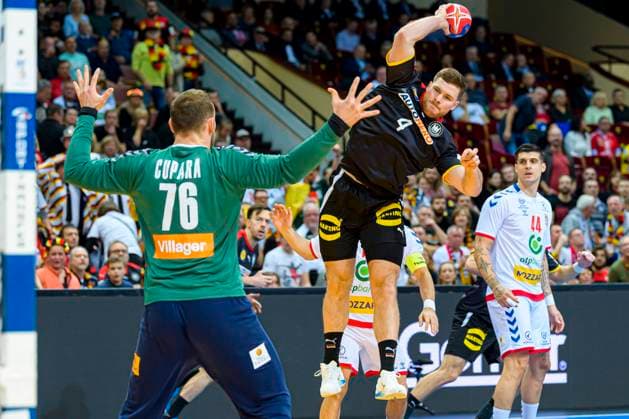 Katowice, 15 January 2023 Handball IHF World Championship, Preliminary Round, Group E, Germany Serbia v li Vladimir Cupara Serbia , Johannes Golla Germany Katowice Spodek Arena Poland