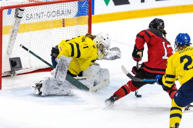 ÖSTERSUND 20230115 Swedens goalkeeper Ida Henriksson saves a shot from Canadas Morgan Jackson during the final of the womens junior ice hockey world championship between Canada and Sweden in Östersund Arena Östersund ICEHOCKEY x11910x,  Copyright: xPerxDanielsson TTx ISHOCKEY-JVM FINAL KANADA-SVERIGE