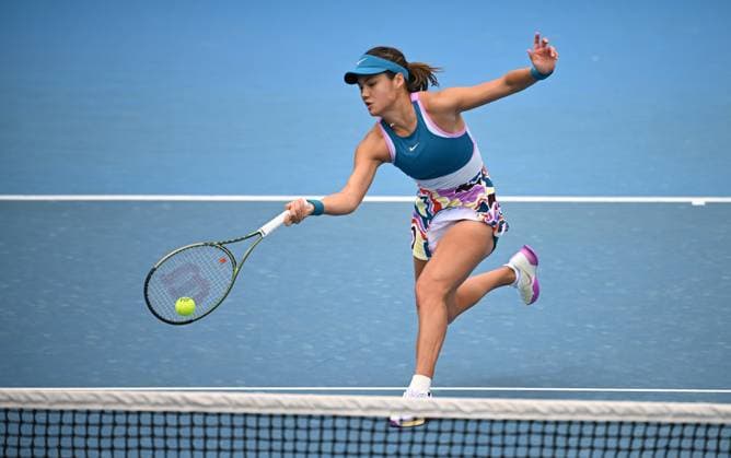 TENNIS AUSTRALIAN OPEN, Emma Raducanu of Great Britain returns during her Women?s Singles 1st round match against Tamara Korpatsch of Germany on Day 1 of the 2023 Australian Open tennis tournament at Melbourne Park in Melbourne, Monday, January 16, 2023. ( NO ARCHIVING, EDITORIAL USE ONLY, NO USE IN BOOKS WITHOUT CONSENT MELBOURNE VICTORIA AUSTRALIA  Copyright: xJAMESxROSSx 20230116001752908083