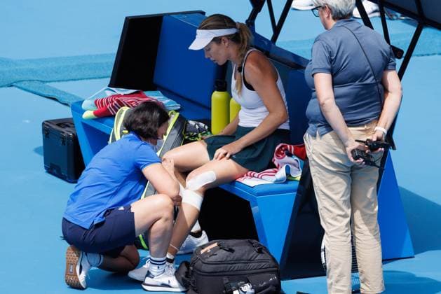 January 16, 2023: 13th seed Danielle COLLINS of the USA receives treatment in a match against Anna KALINSKAYA in the Women s Singles match on day 1 of the 2023 Australian Open on Rod Laver Arena, in Melbourne, Australia. Cal Media. USA - ZUMAc04_ 20230116_zaf_c04_024 Copyright: xSydneyxLowx