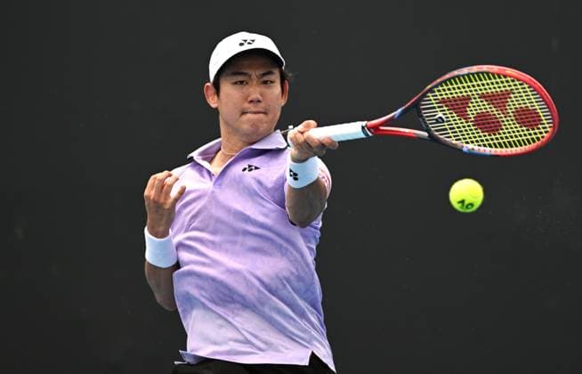 TENNIS AUSTRALIAN OPEN, Yoshito Nishioka of Japan returns during his Men?s Singles 1st Round match against Michael Ymer of Sweden on Day 1 of the 2023 Australian Open tennis tournament at Melbourne Park in Melbourne, Monday, January 16, 2023. ( NO ARCHIVING, EDITORIAL USE ONLY, NO USE IN BOOKS WITHOUT CONSENT MELBOURNE VICTORIA AUSTRALIA  Copyright: xLUKASxCOCHx 20230116001752963542