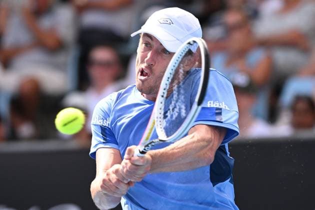 TENNIS AUSTRALIAN OPEN, John Millman of Australia in action during his Men?s Singles Round 1 against Marc-Andrea Huesler of Switzerland on Day 1 of the 2023 Australian Open tennis tournament at Melbourne Park in Melbourne, Monday, January 16, 2023. ( NO ARCHIVING, EDITORIAL USE ONLY, NO USE IN BOOKS WITHOUT CONSENT MELBOURNE VICTORIA AUSTRALIA  Copyright: xJamesxRossx 20230116001752987026